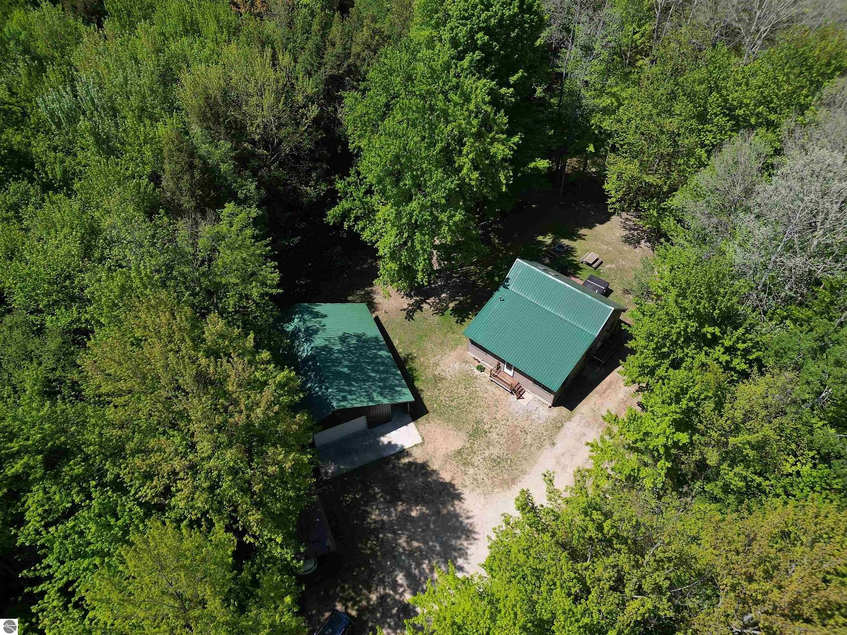 20 Acres of Recreational Land with Home for Sale in Thompsonville, Michigan