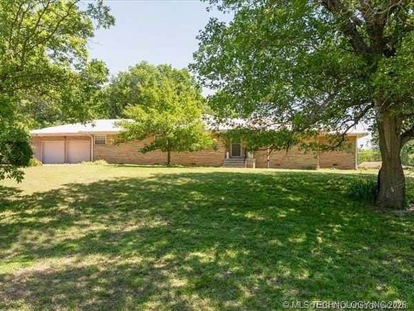 4.66 Acres of Land with Home for Sale in Nowata, Oklahoma