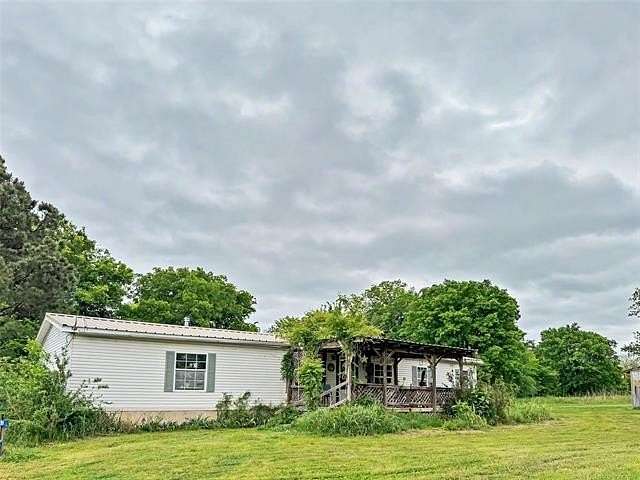 16.2 Acres of Land with Home for Sale in Hulbert, Oklahoma