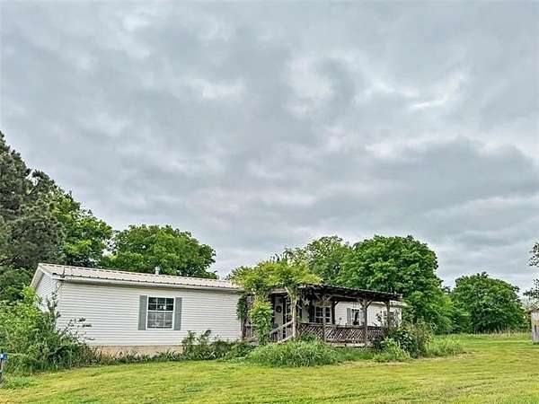 16.2 Acres of Land with Home for Sale in Hulbert, Oklahoma