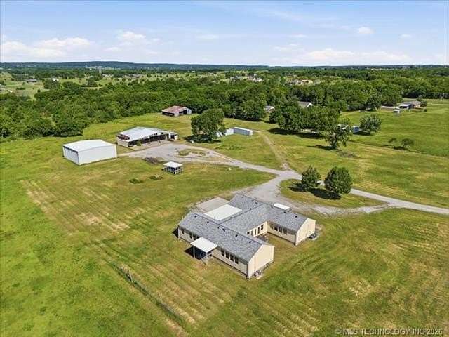 33.3 Acres of Agricultural Land with Home for Auction in Mounds, Oklahoma