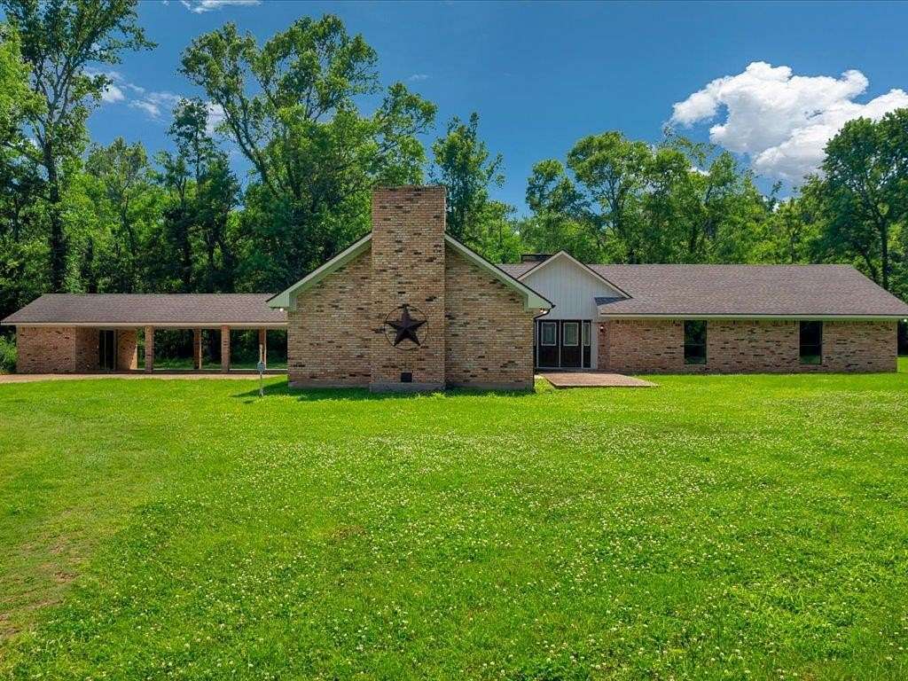 1.59 Acres of Land with Home for Sale in Timpson, Texas