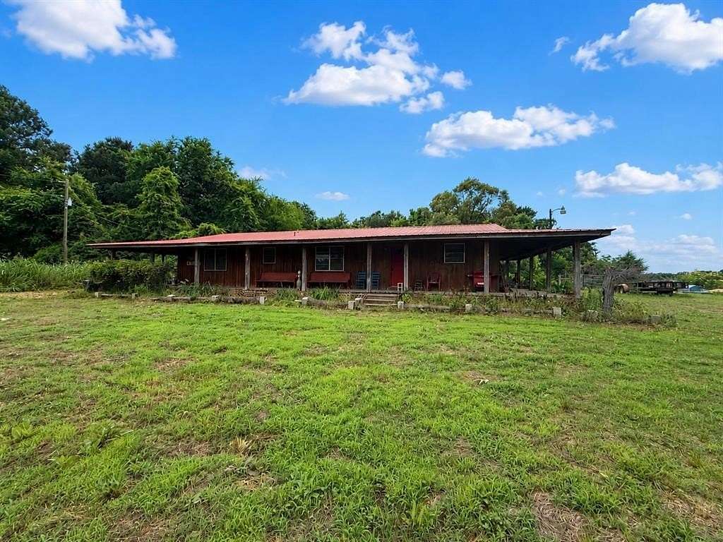 2 Acres of Land with Home for Sale in Pittsburg, Texas