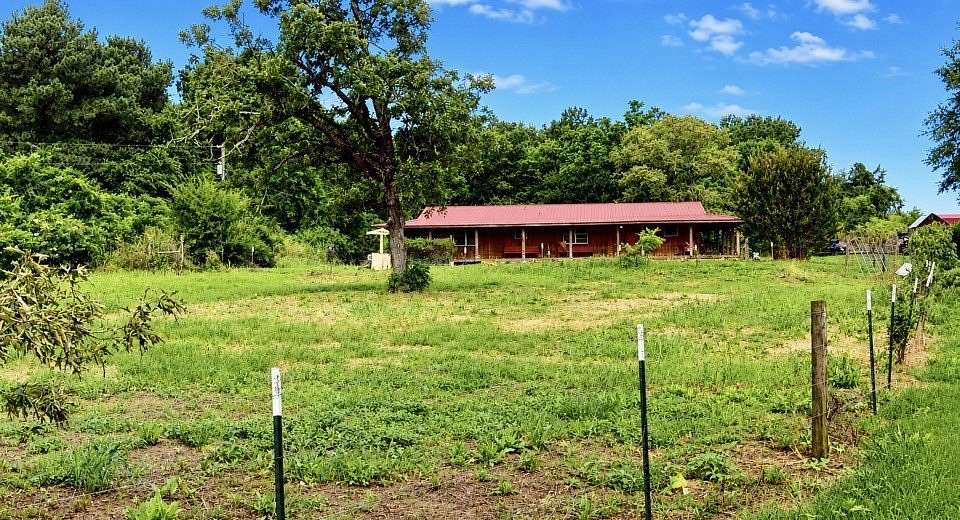 2 Acres of Land with Home for Sale in Pittsburg, Texas