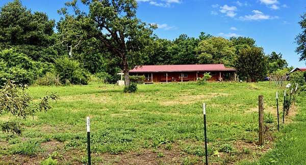 2 Acres of Land with Home for Sale in Pittsburg, Texas