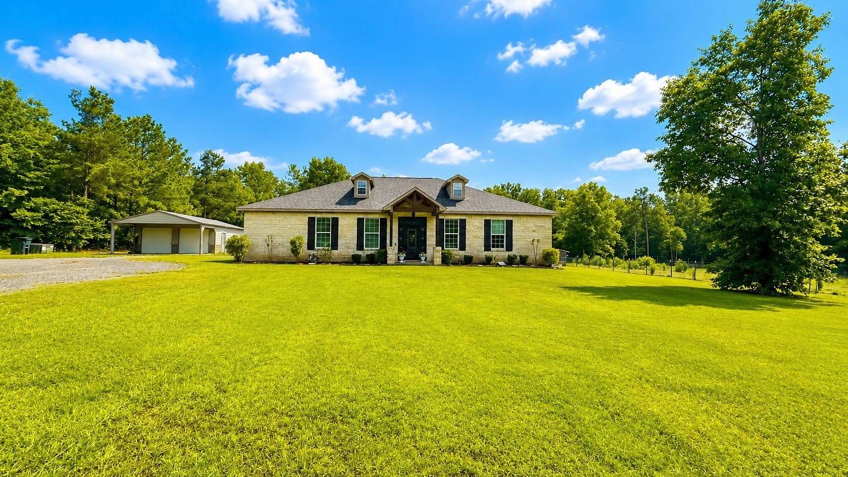 3.9 Acres of Land with Home for Sale in Carthage, Texas