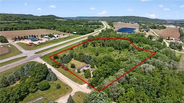 7.77 Acres of Land with Home for Sale in Greenfield Township, Minnesota