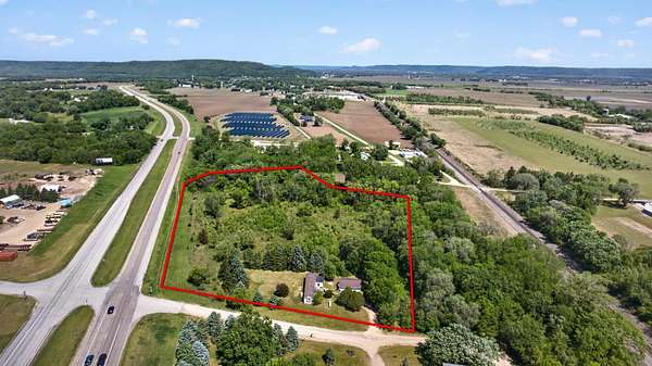 7.77 Acres of Land with Home for Sale in Greenfield Township, Minnesota