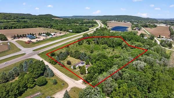 7.77 Acres of Land with Home for Sale in Greenfield Township, Minnesota