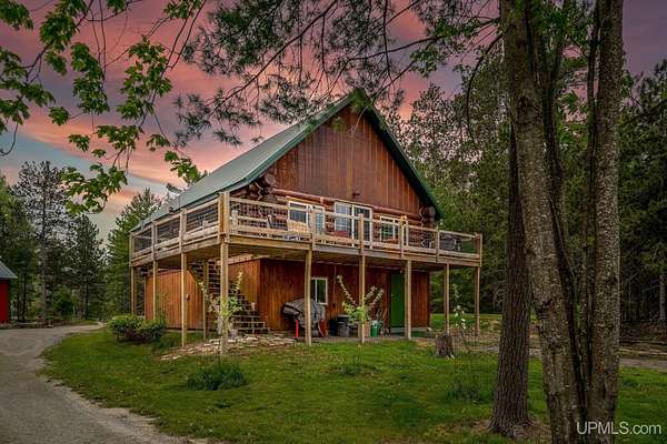 5.9 Acres of Land with Home for Sale in Rapid River, Michigan