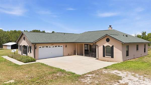 14.7 Acres of Land with Home for Sale in Umatilla, Florida