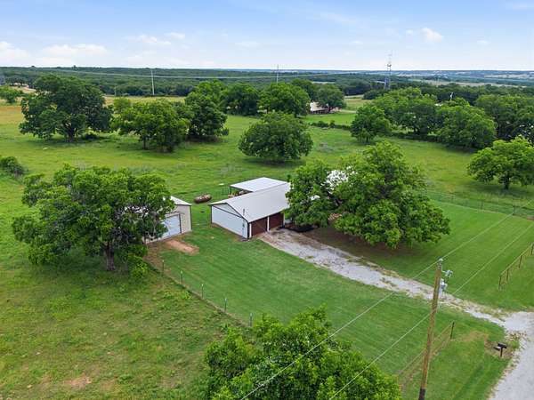 5 Acres of Land with Home for Sale in Poolville, Texas