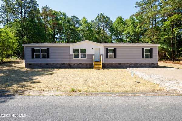 10.3 Acres of Land with Home for Sale in Jackson Springs, North Carolina