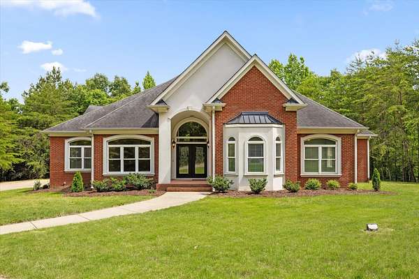 7.43 Acres of Land with Home for Sale in Ooltewah, Tennessee