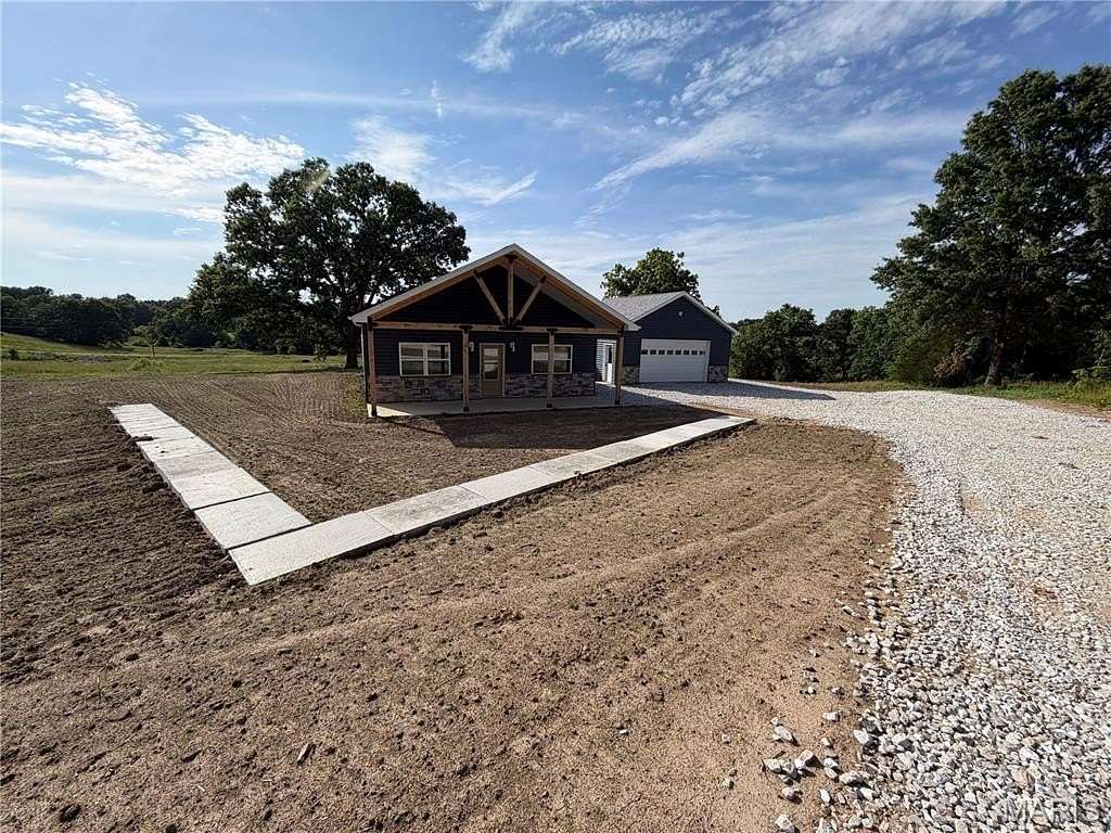 7 Acres of Improved Residential Land for Sale in Madison, Missouri