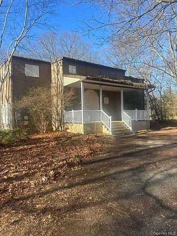 2.3 Acres of Land with Home for Sale in Kings Park, New York