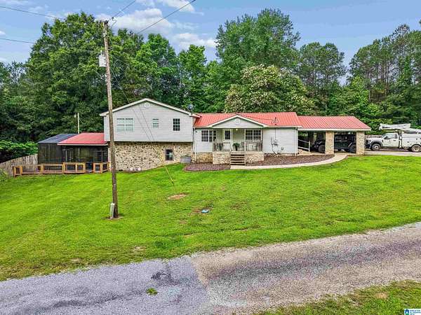 38 Acres of Land with Home for Sale in Columbiana, Alabama