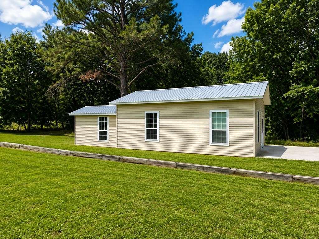 3 Acres of Land with Home for Sale in Opp, Alabama