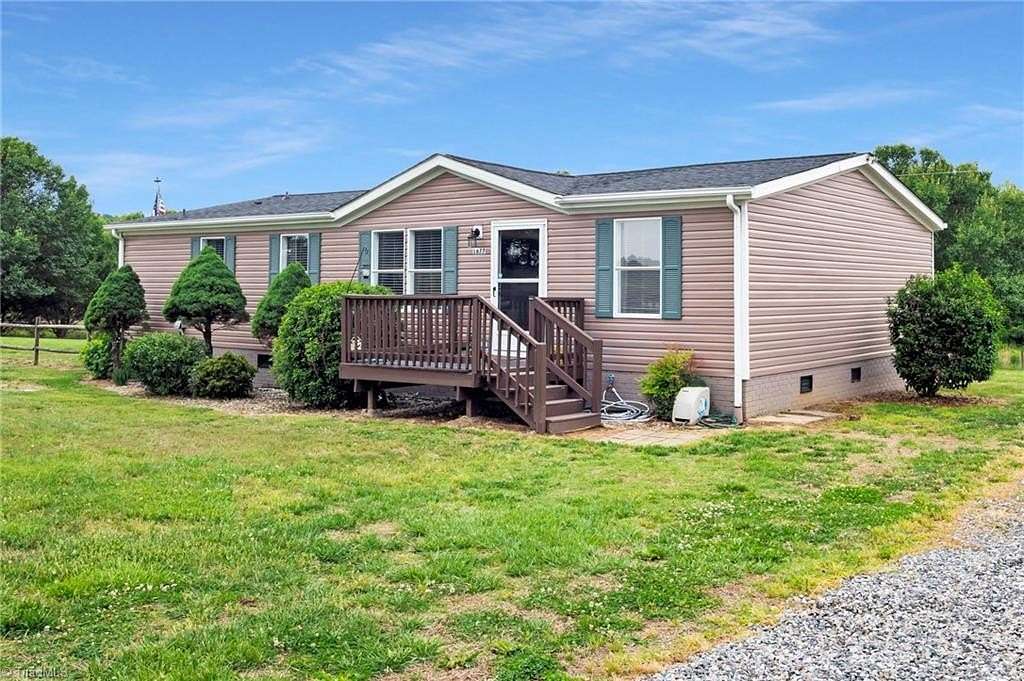1.76 Acres of Land with Home for Sale in Olin, North Carolina