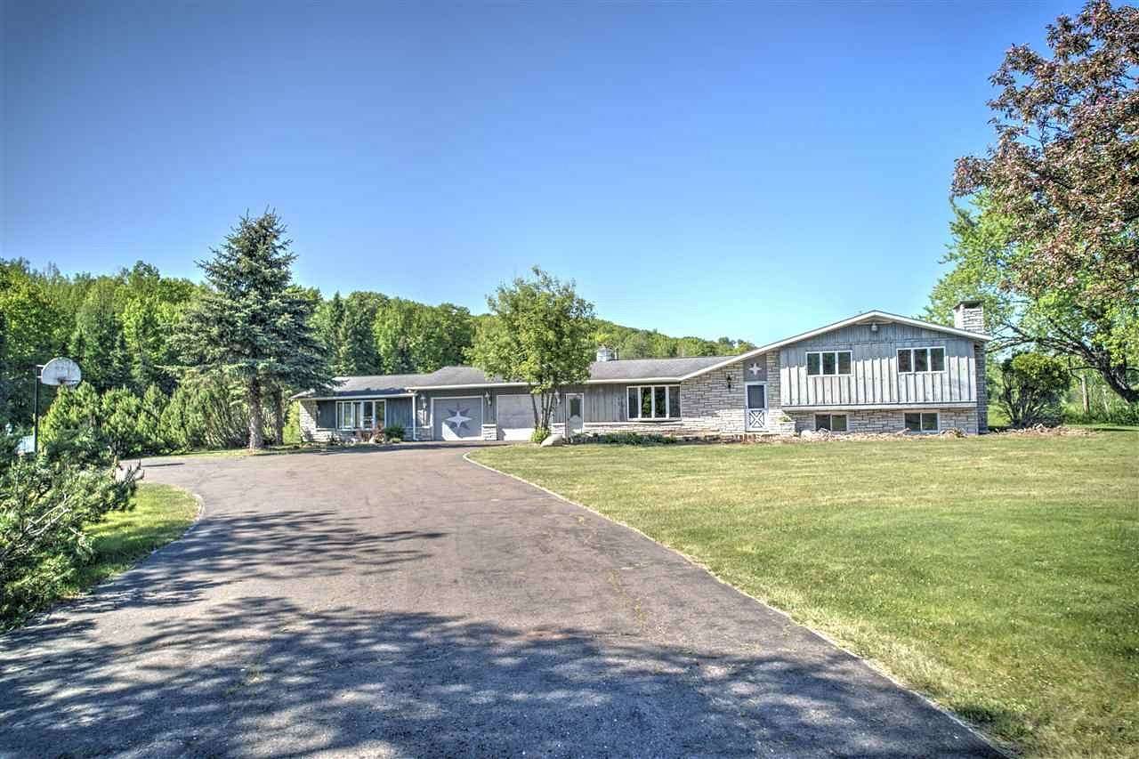 16 Acres of Land with Home for Sale in Bessemer, Michigan