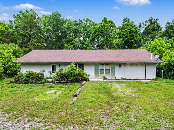 8.7 Acres of Land with Home for Sale in Kodak, Tennessee
