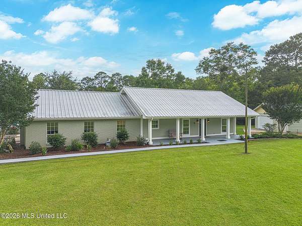10.6 Acres of Land with Home for Sale in Biloxi, Mississippi