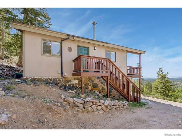 2 Acres of Land with Home for Sale in Red Feather Lakes, Colorado