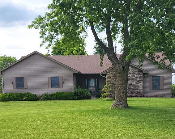 1.57 Acres of Land with Home for Sale in Norwalk, Iowa