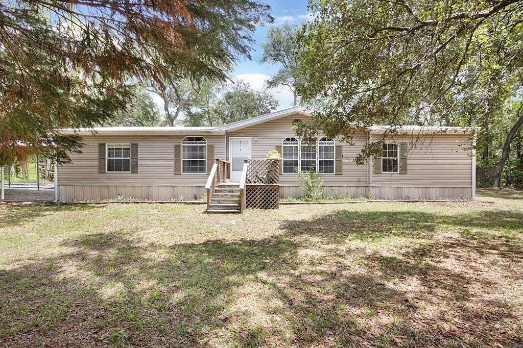 1.86 Acres of Land with Home for Sale in Chiefland, Florida