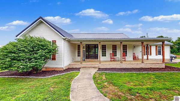 10 Acres of Land with Home for Sale in Benton, Kentucky