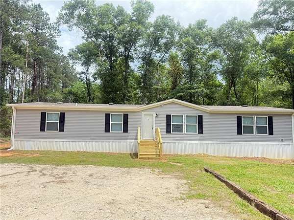 6.6 Acres of Land with Home for Sale in Citronelle, Alabama