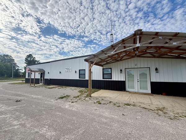 0.95 Acres of Commercial Land for Sale in Rocky Comfort, Missouri