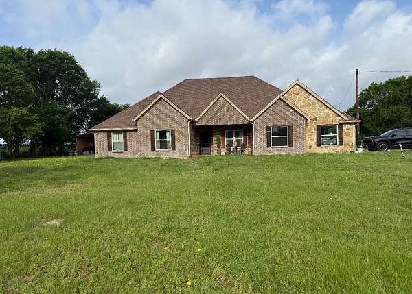 4.17 Acres of Land with Home for Sale in Cumby, Texas