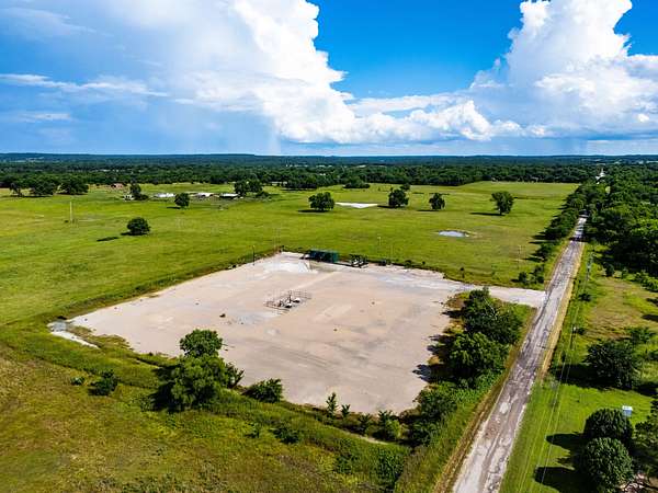 5.59 Acres of Mixed-Use Land for Sale in Mannsville, Oklahoma