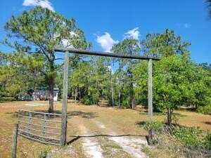 5 Acres of Land with Home for Auction in Okeechobee, Florida