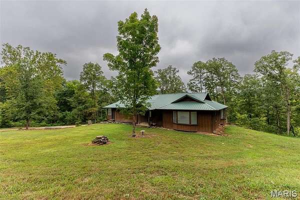 57.8 Acres of Land with Home for Sale in Licking, Missouri