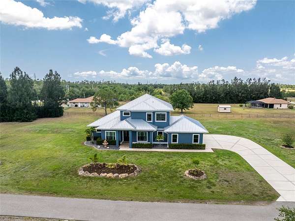 7.44 Acres of Land with Home for Sale in Punta Gorda, Florida