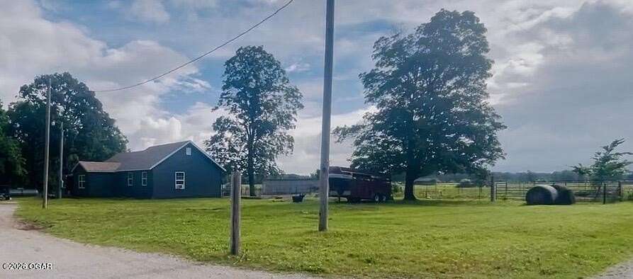 10 Acres of Land with Home for Sale in Neosho, Missouri