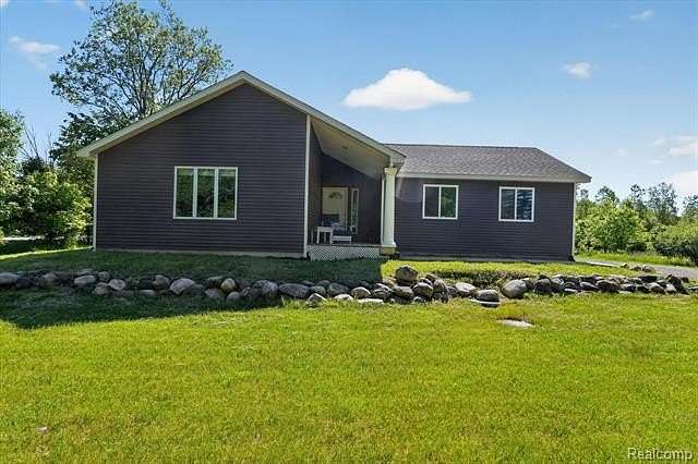 1.59 Acres of Land with Home for Sale in Oceola Township, Michigan
