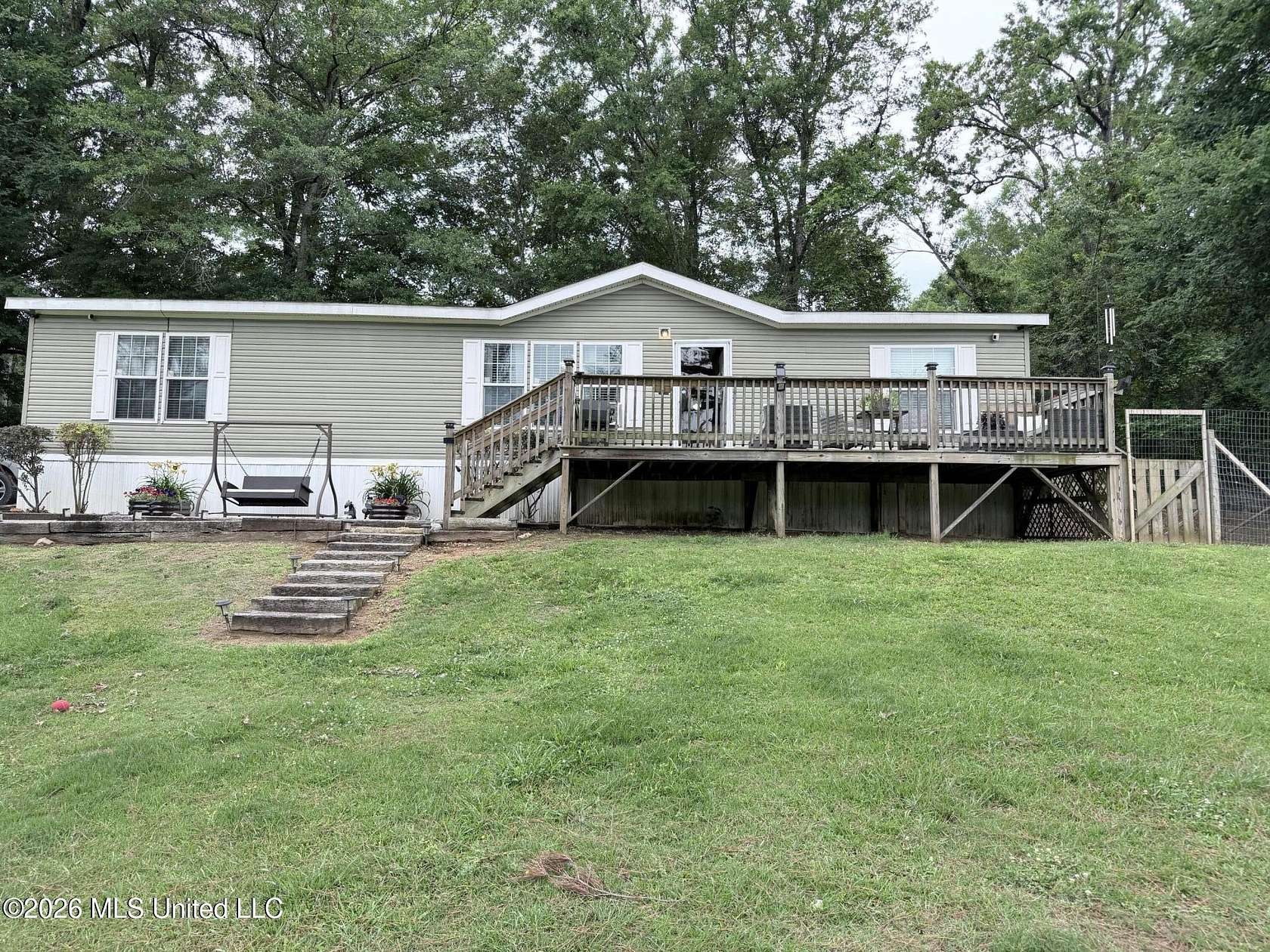 5 Acres of Land with Home for Sale in Oxford, Mississippi
