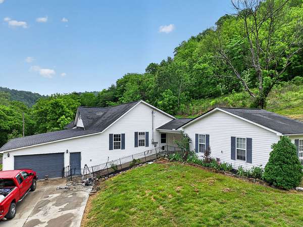 10 Acres of Recreational Land with Home for Auction in Liberty, Tennessee