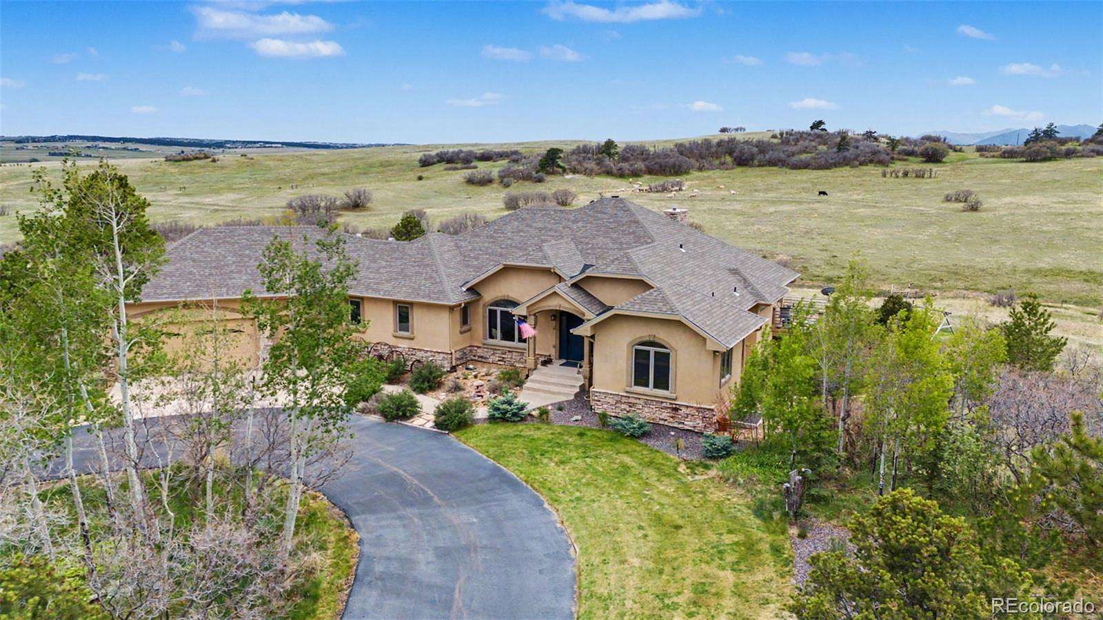 35 Acres of Agricultural Land with Home for Sale in Larkspur, Colorado