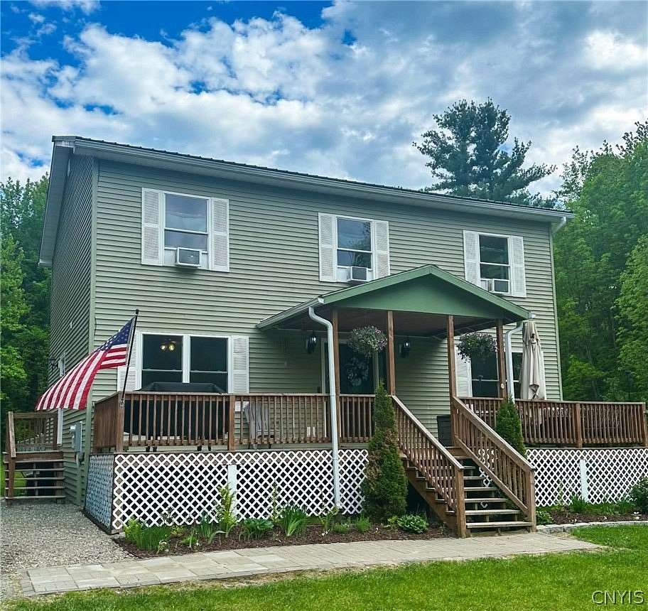 6.69 Acres of Land with Home for Sale in Carthage, New York