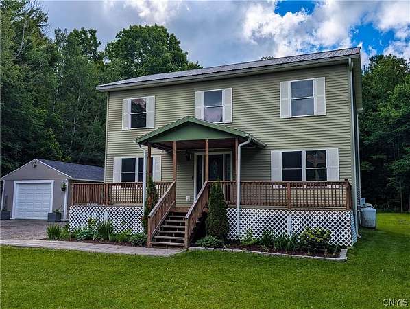 6.69 Acres of Land with Home for Sale in Carthage, New York