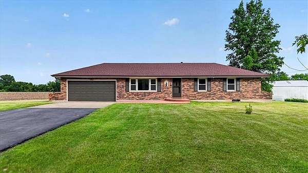 10 Acres of Land with Home for Sale in Harrisonville, Missouri