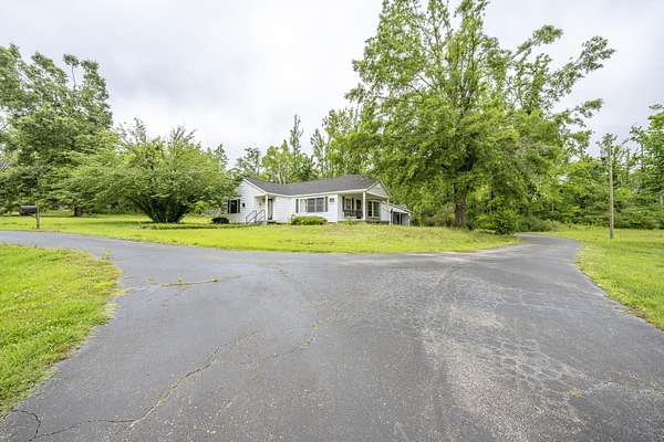 6 Acres of Land with Home for Sale in Michie, Tennessee