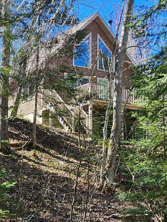 2.1 Acres of Land with Home for Sale in Millersburg, Michigan