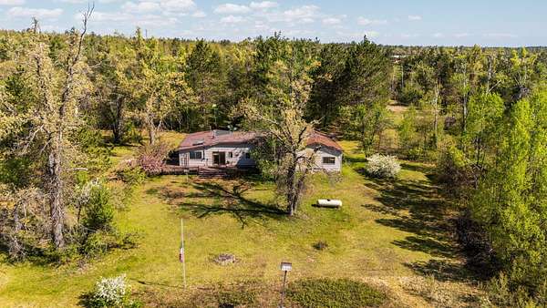 10 Acres of Recreational Land with Home for Sale in Lewiston, Michigan
