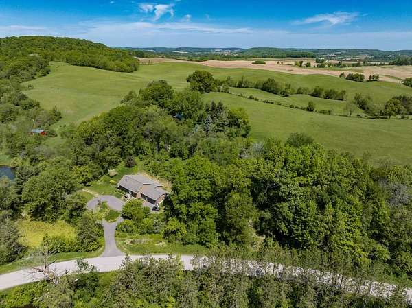 76 Acres of Agricultural Land with Home for Sale in Kendall, Wisconsin