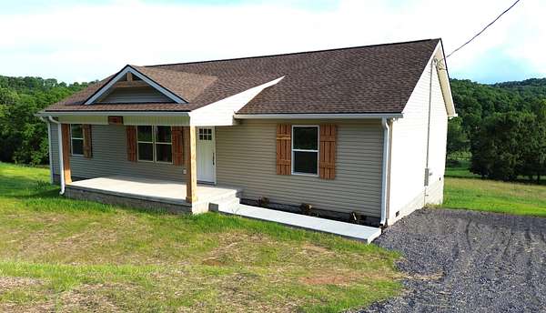 2 Acres of Land with Home for Sale in Brush Creek, Tennessee